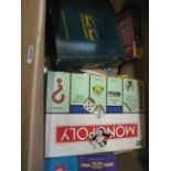 Large box of games and puzzles incl. Monopoly, Trivial Pursuit, Rivals for Catan, etc.