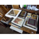 Table top of assorted pictures, prints and mirrors