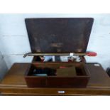 Mahogany sewing box with contents and stirrup pump