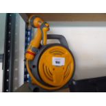 Small Hozelock garden hose with sprayer head