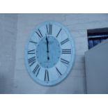 Blue oval wall clock