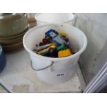 2 buckets of assorted children's scale model toys