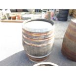 Metal banded wooden barrel