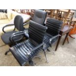 Pair of chrome and black leather effect office armchairs