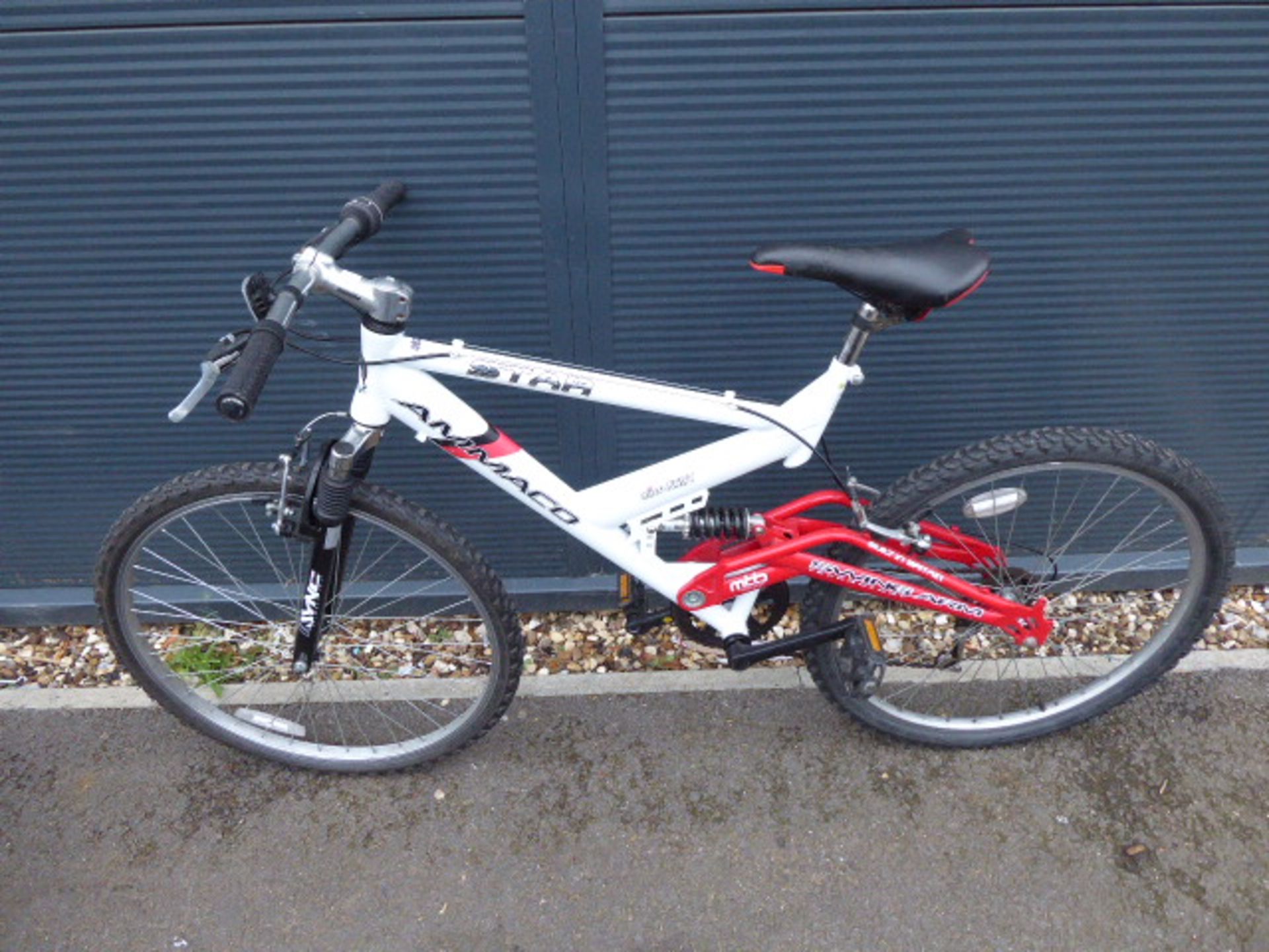 White and red suspension mountain bike