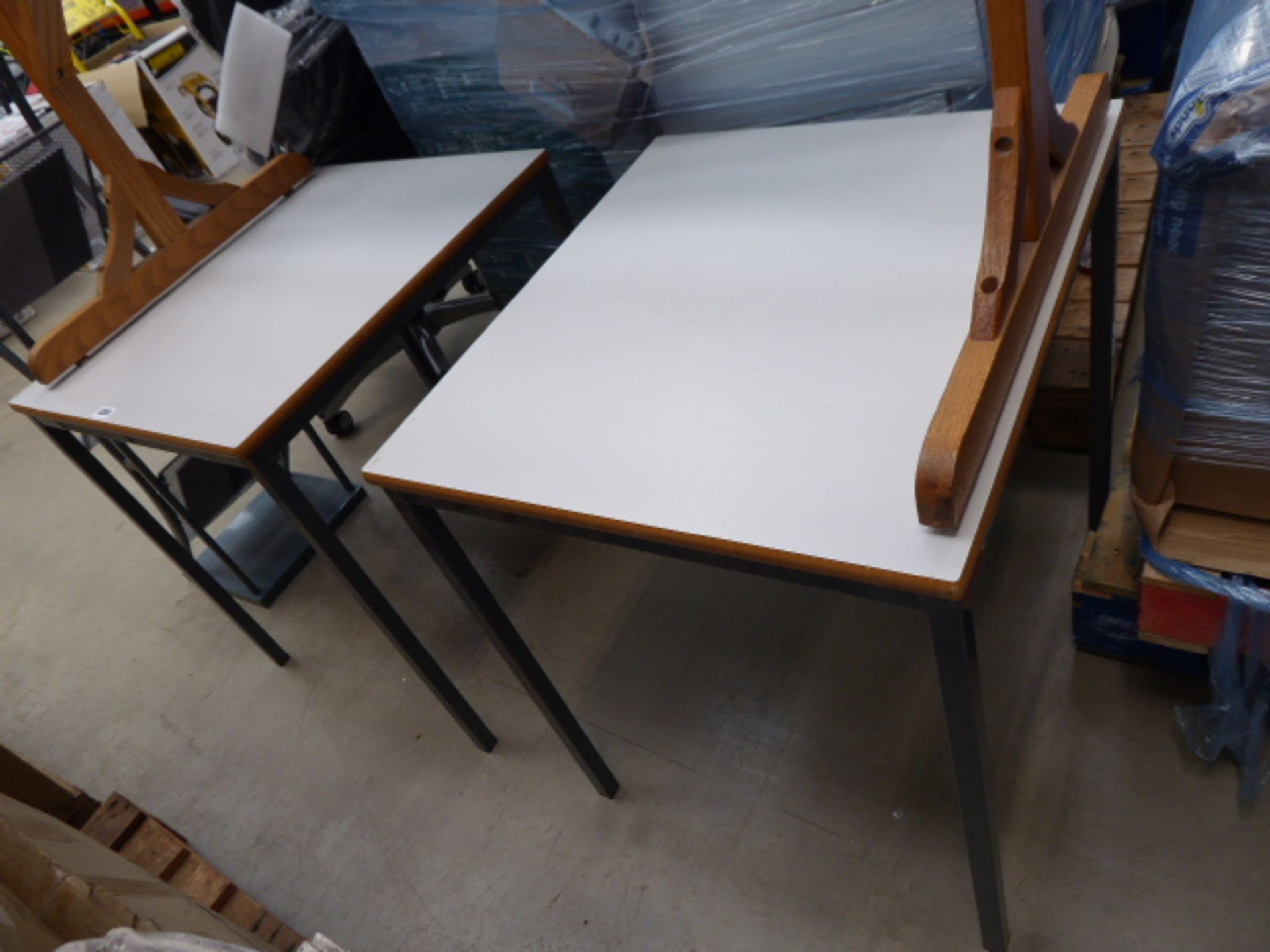 2 small grey topped tables