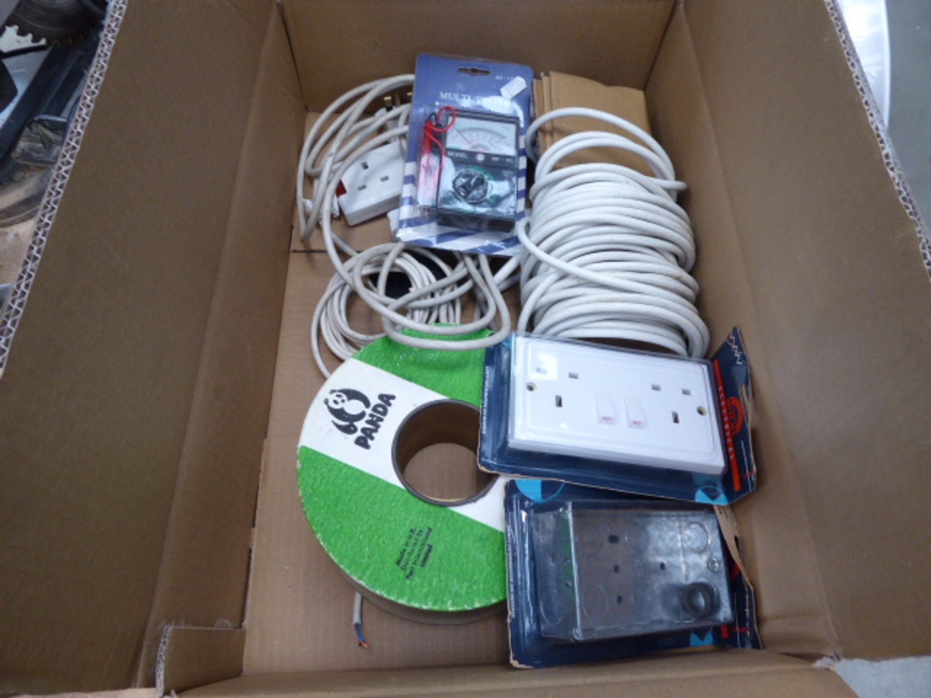 Box containing electrical cable, multimeter, sockets, etc