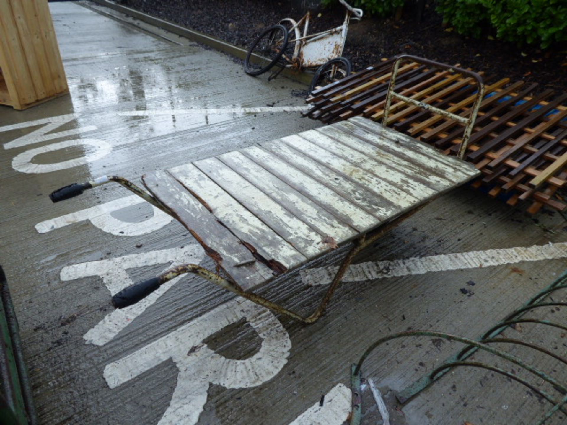 Wooden single wheeled barrow