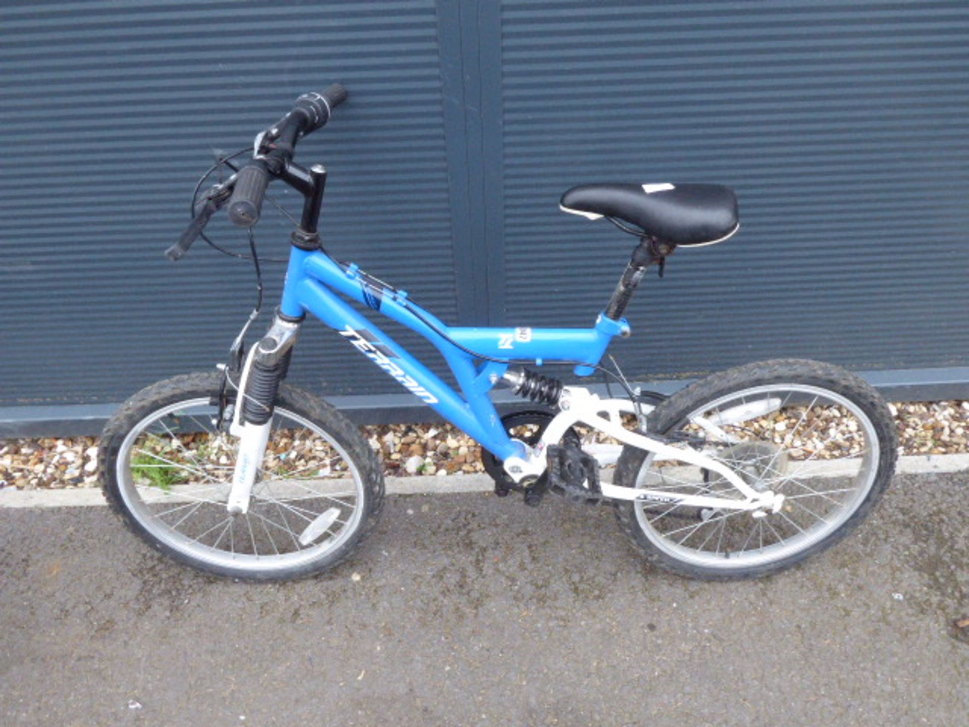 Blue and white childs suspension mountain bike