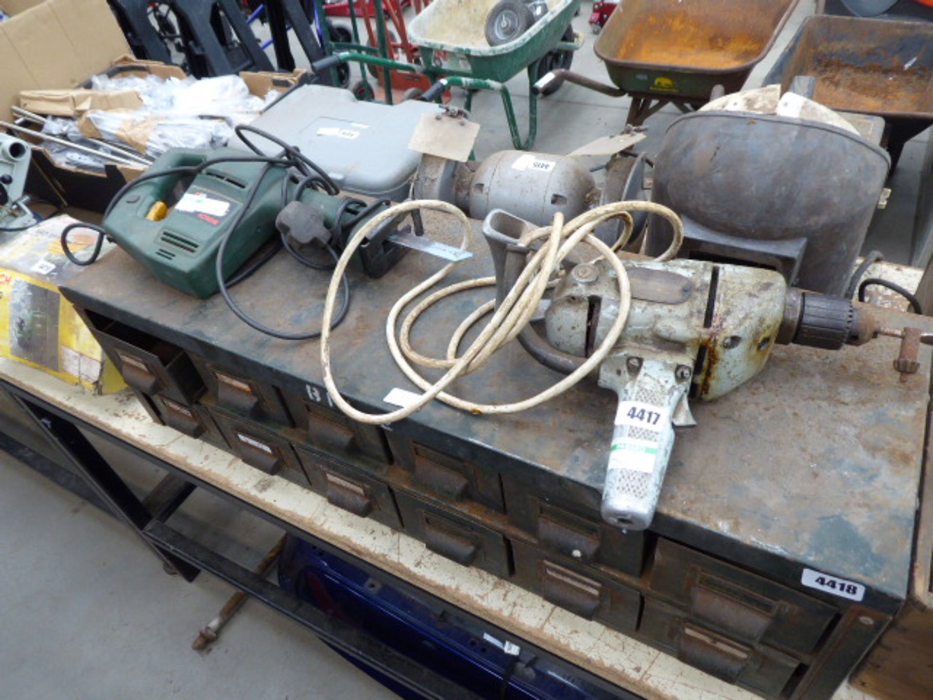 Boxed reciprocating saw and a large vintage drill