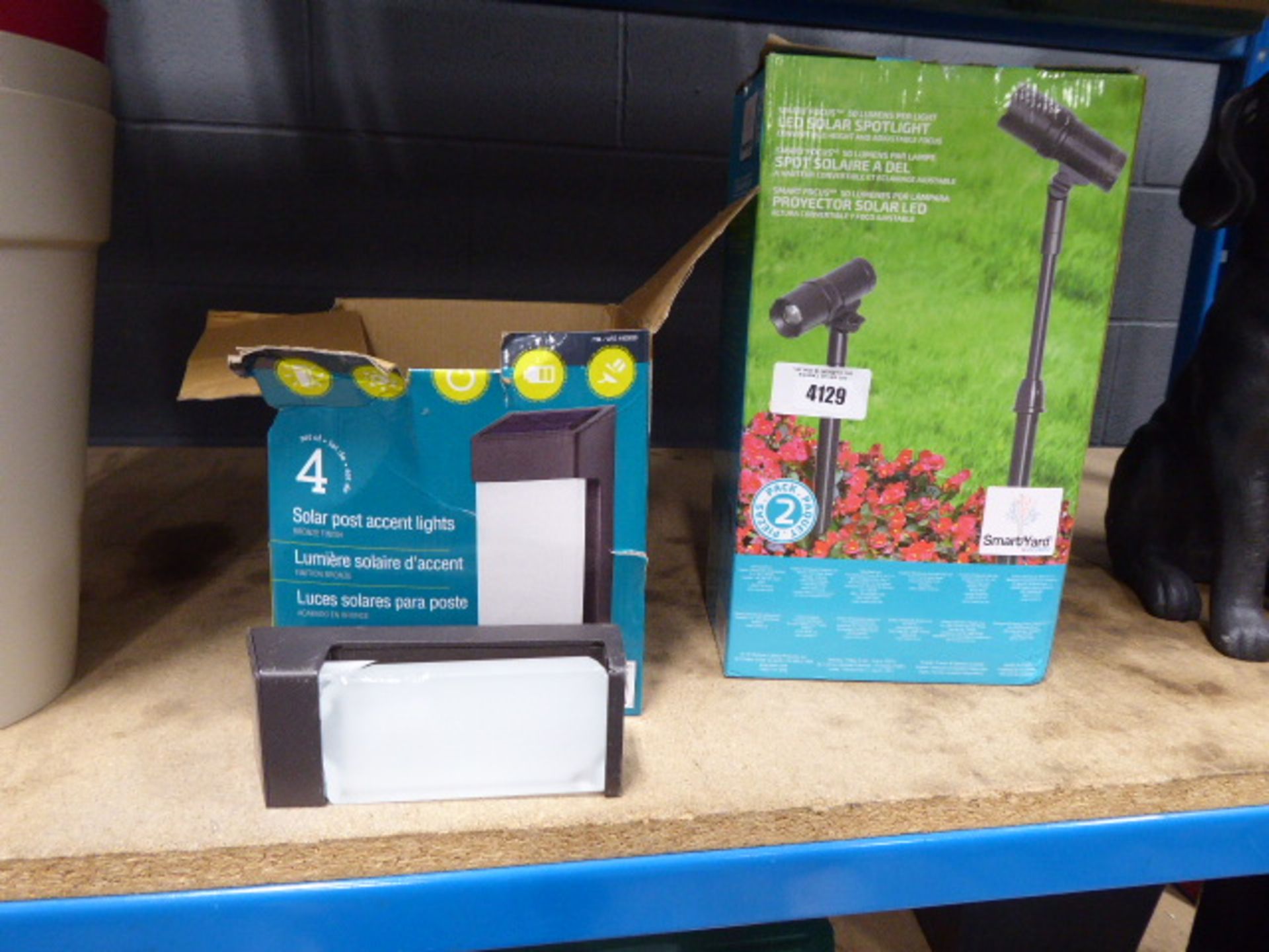 Boxed solar smart spotlight and some post lights