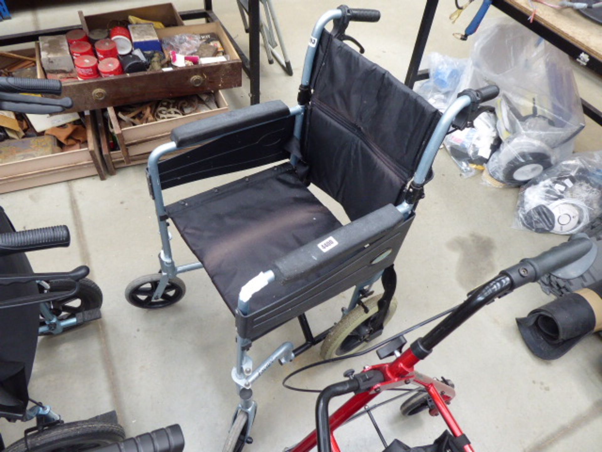 Escape blue and black fold up wheelchair