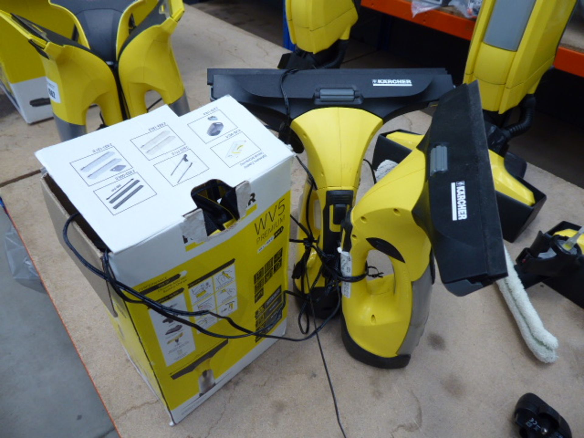 A boxed Karcher window vac plus 2 unboxed with 3 chargers