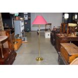 Brass finished floor lamp with shade