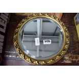 Mid-20th century circular bevelled mirror in gilt frame