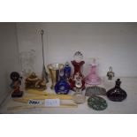 2 metal and beaded purses, scent bottles, a ruby glass bottle, a candle snuffer plus an erotic