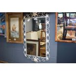 White metal framed mirror