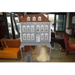 5404 Large grey painted dolls house on raised supports