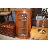 Reproduction mahogany bow fronted corner unit