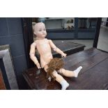 454 A Simon & Halbig bisque headed doll with sleeping blue glass eyes and open mouth showing four