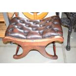 Button upholstered X framed stool