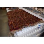 Woollen rug with geometric pattern