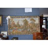 Wall tapestry with brass rail