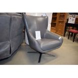 Pulaski leather effect swivel armchair