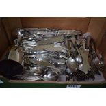 Box containing loose silver plated cutlery including fish knives and forks, a Mappin & Webb cup