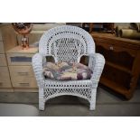 White painted cane conservatory armchair