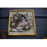 Cross stitch tapestry depicting a kitten