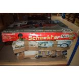 3 boxes containing Scalextric track