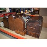 Four Victorian and later cased Singer sewing machines