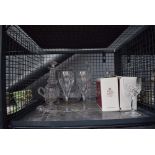 Cage containing decanters and wine glasses including Royal Albert lead crystal