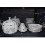 Cage containing floral patterned crockery inc. tureens, gravy boat, side plates and dishes