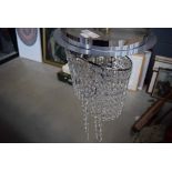 2 boxes containing a chrome ceiling light with crystals, metal ornamental elephant, plant pots and