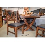 Dark wood extending dining table and 6 chairs