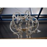 Glass and metal ceiling light with floral decoration