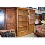 Pine open fronted bookcase with rope twist pattern and drawers under