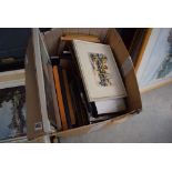 2 boxes containing a large quantity of prints and photo frames