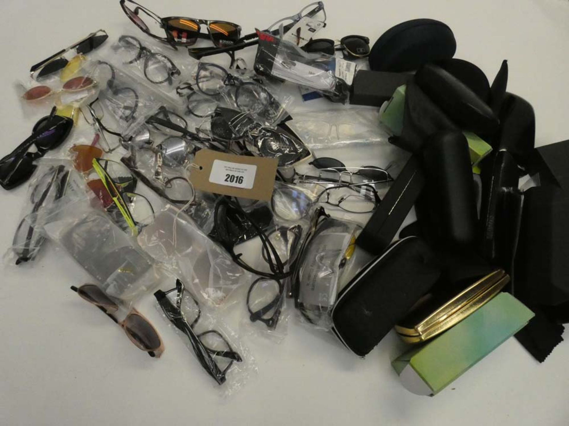 Bag containing quantity of reading glasses and sunglasses plus various empty cases