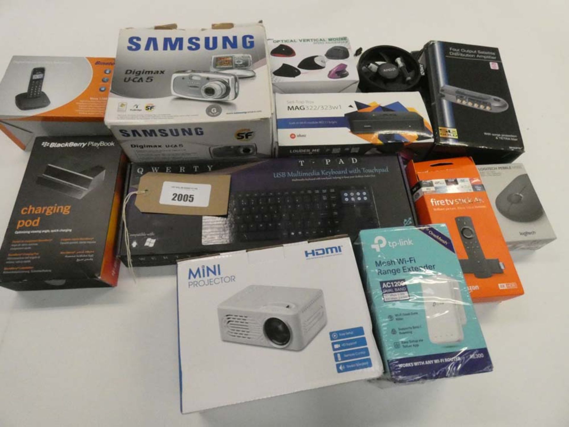 Bag containing quantity of miscellaneous electrical related items; Samsung camera, mini projector,