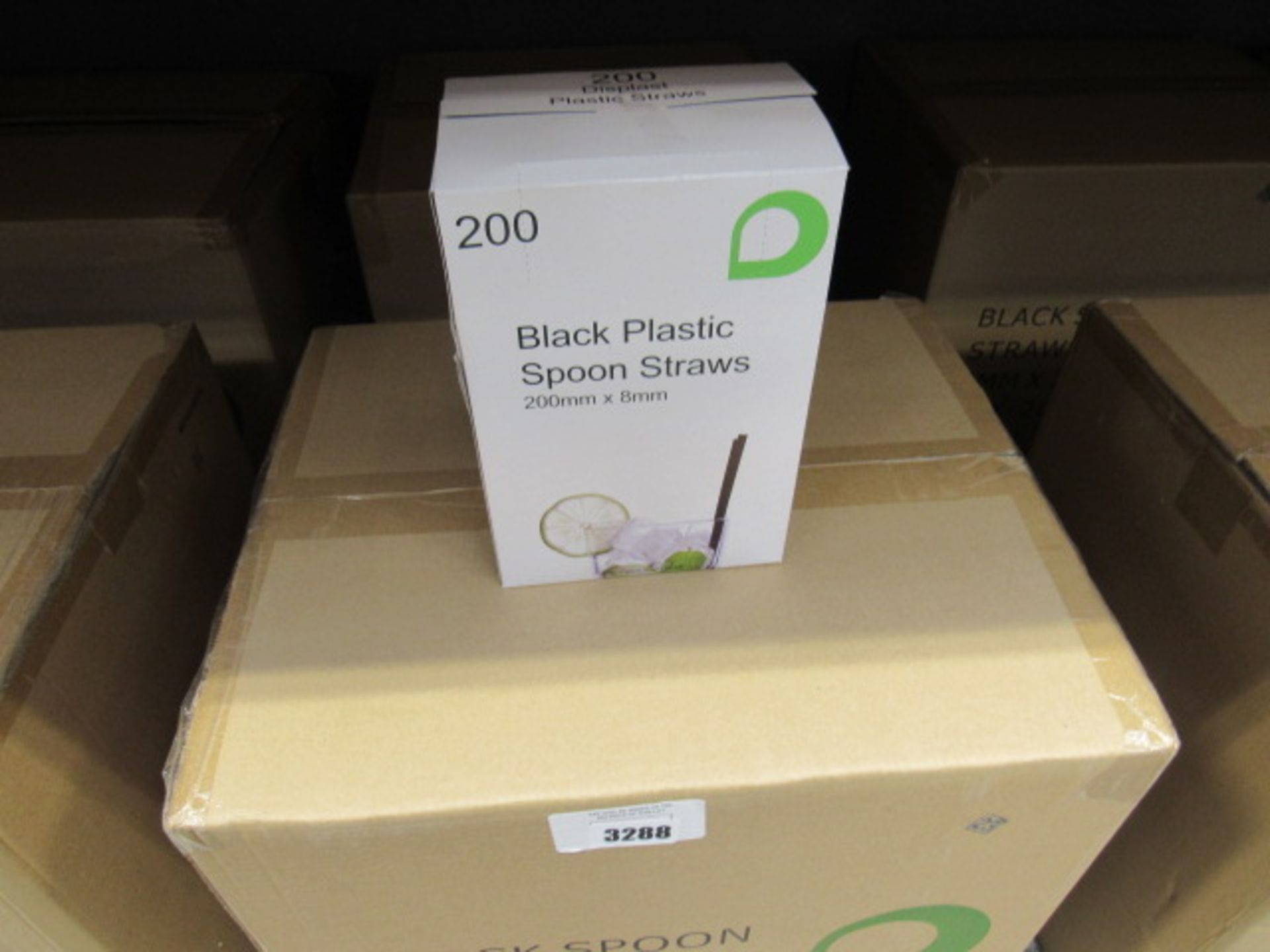 Two boxes containing black spoon straws