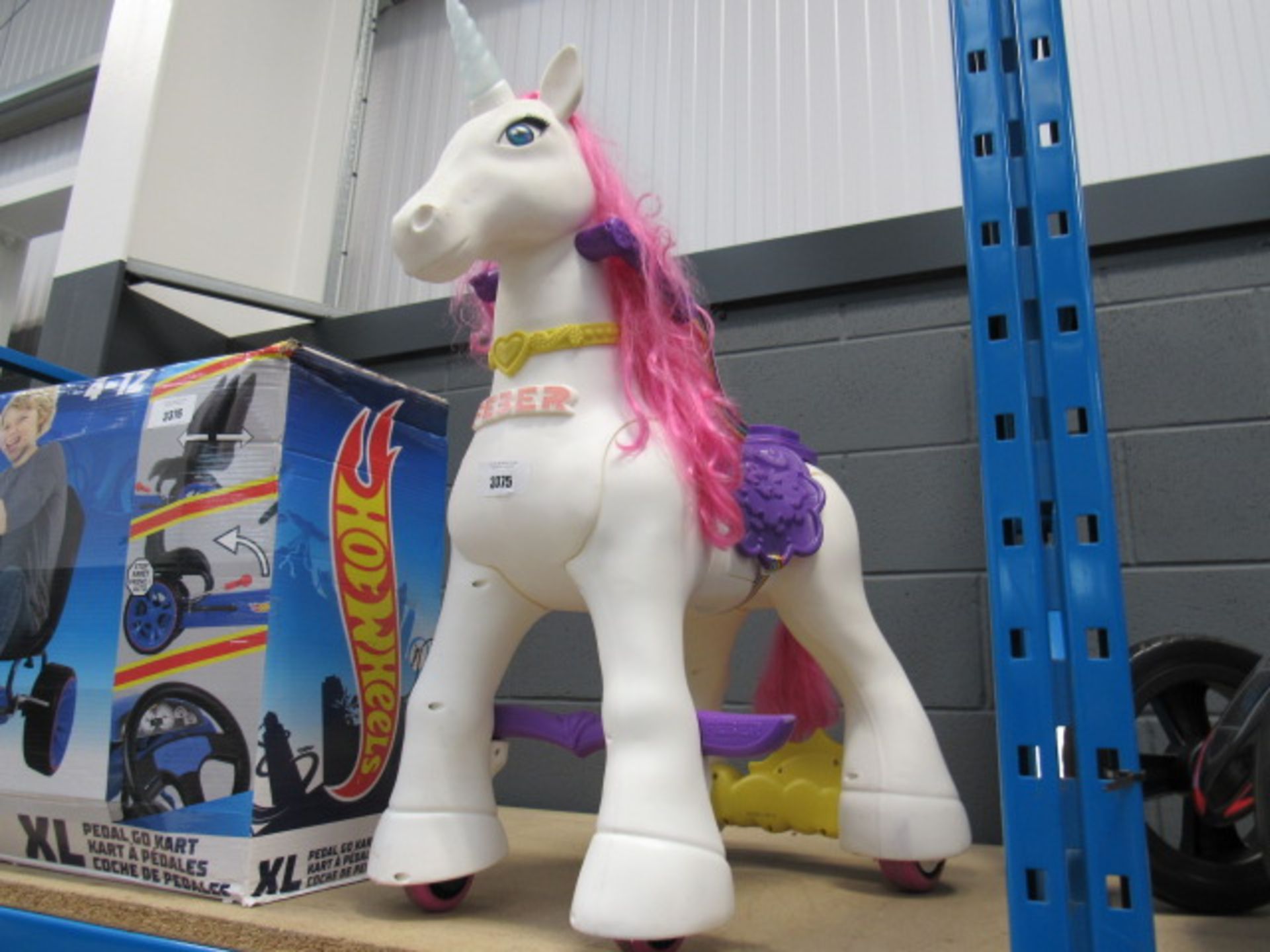 Sit on unicorn toy