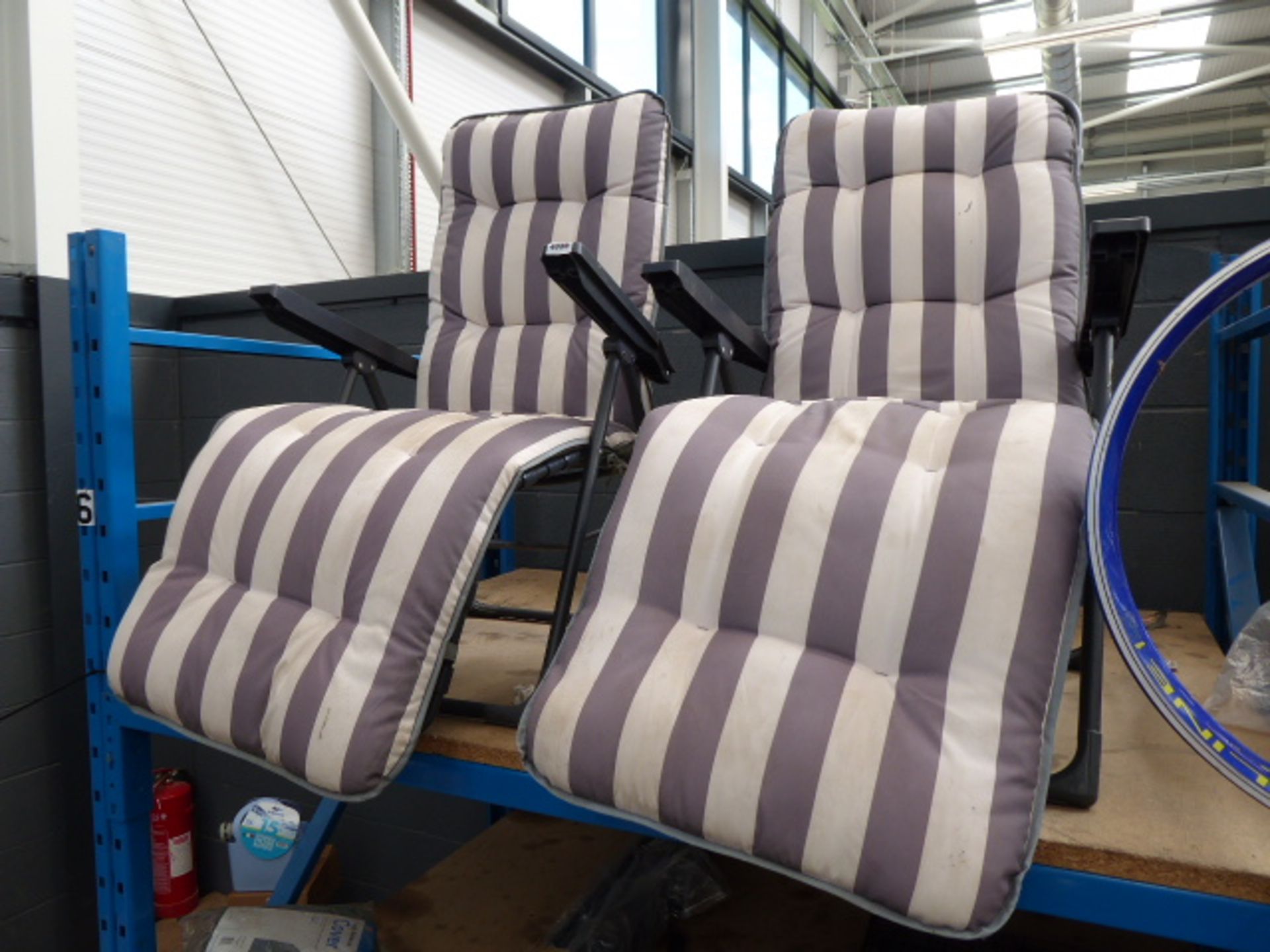 2 grey and white striped garden chairs