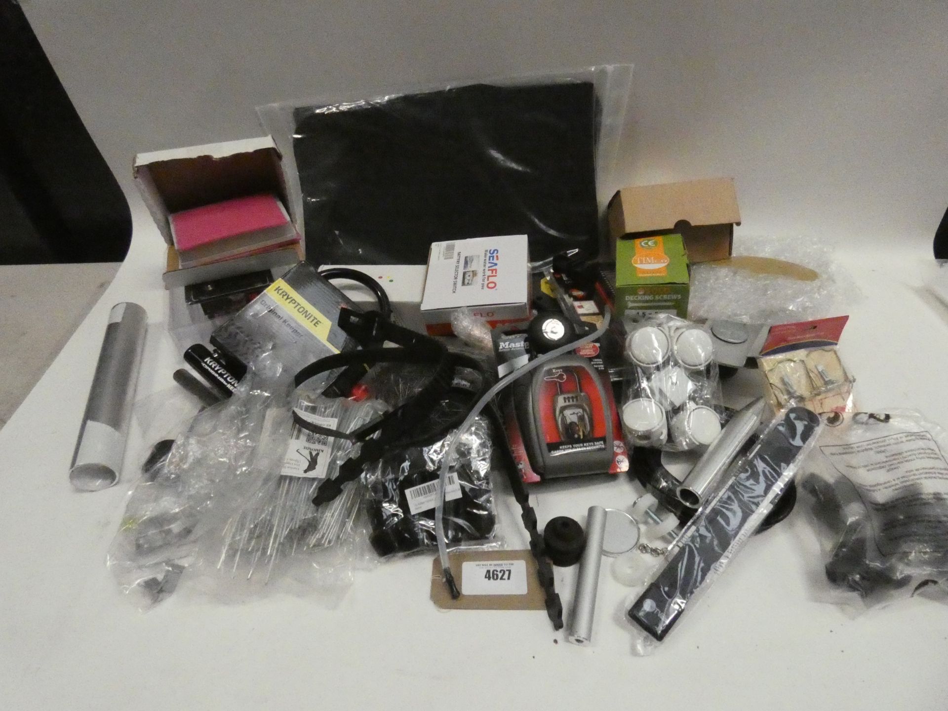 Bag containing decking screws, locks, straps, pins, castors, small pump, gauge, wheels etc
