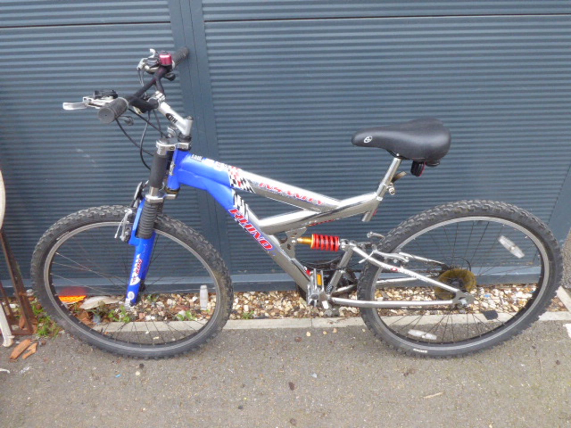 Silver and blue mountain bike