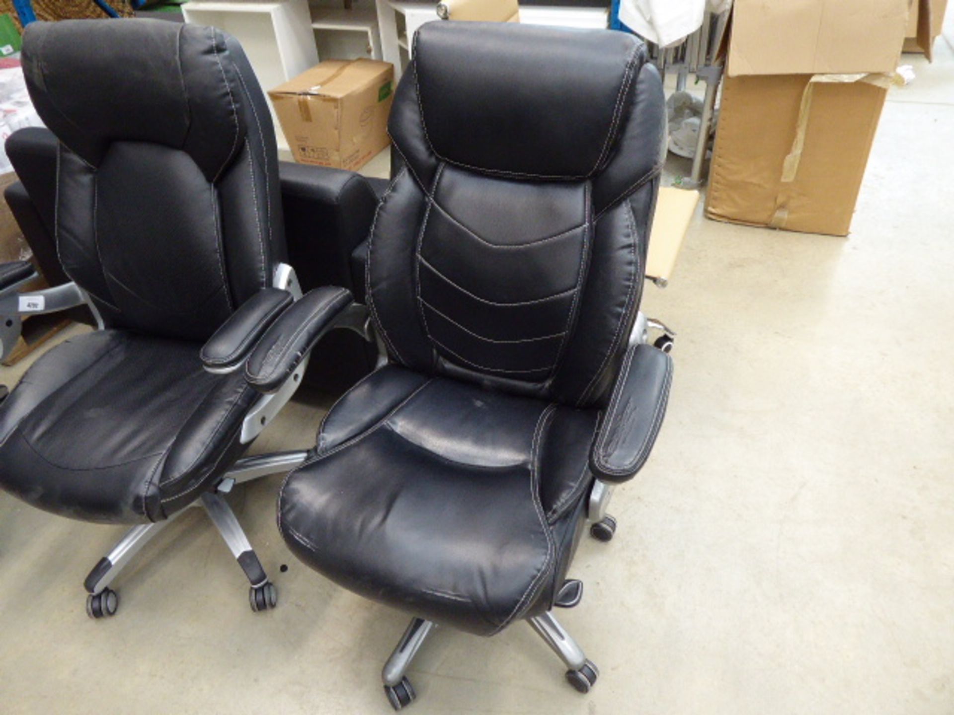 Black high-back executive swivel armchair (worn)