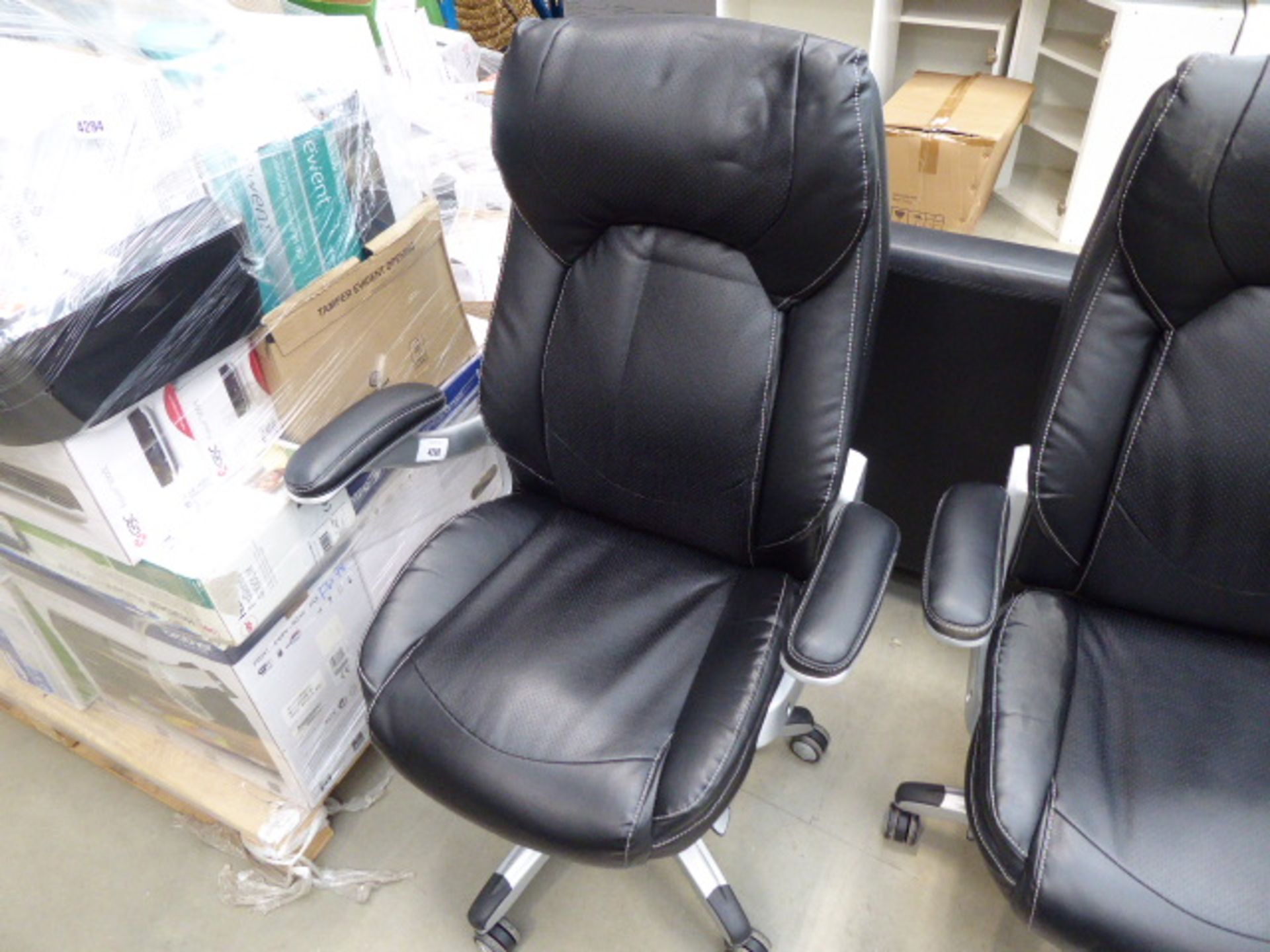 Black high-back executive swivel armchair