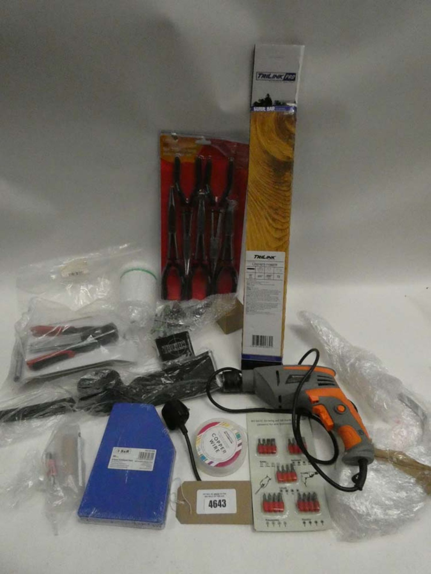 Bag containing long reach pliers, tri-link guide bar, Terratek impact drill, bit set, pick axe head,